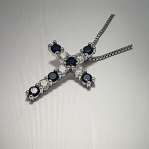 Elegant Silver and Black Cross Pendant Necklace
NWOT